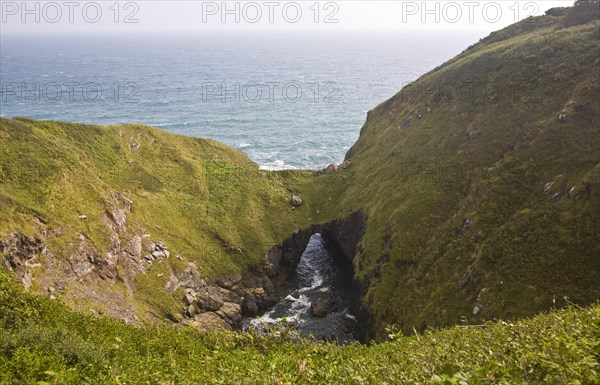 The Devil's Frying Pan coastal feature formed by the collapse and erosion of a large sea cave near