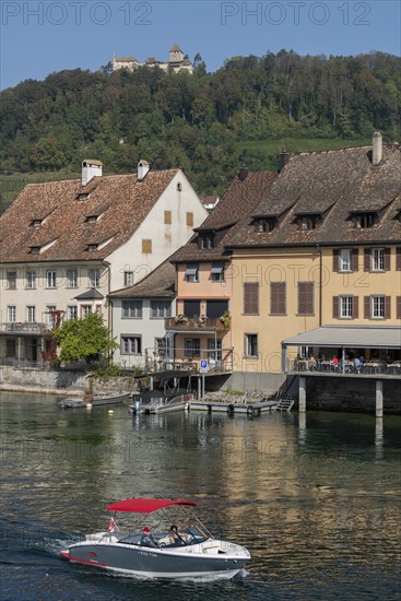 Stein am Rhein, Hohenklingen Castle, mountain, restaurant on the water, sports boat, blue sky,