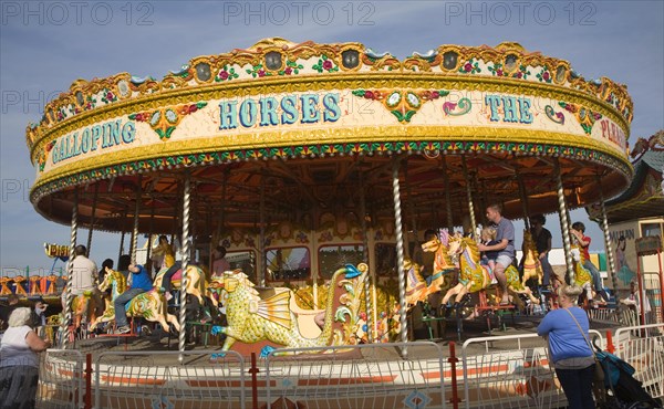 Galloping Horse traditional fairground carousel ride, Great Yarmouth, Norfolk, England, United