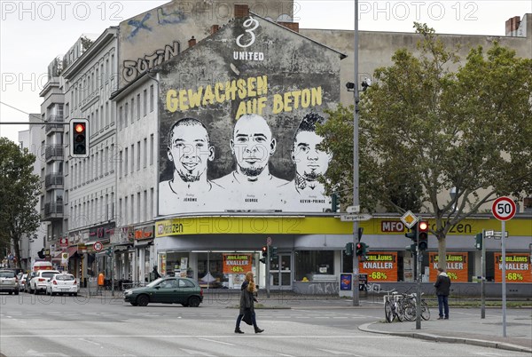 A picture of the brothers Jerome Boateng, George Boateng and Kevin-Prince Boateng can be seen on a