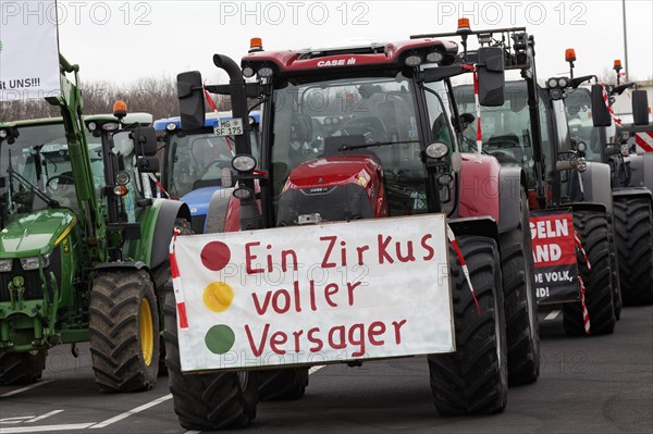 Tractor with sign, A circus full of losers, Farmer protests, Demonstration against policies of the