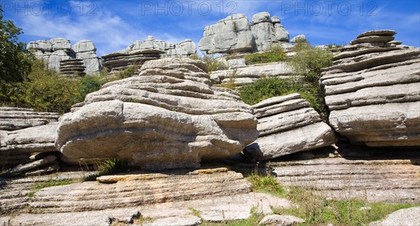 Dramatic limestone scenery of rocks shaped by erosion and weathering at El Torcal de Antequera