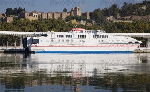 Alcantara Dos catamaran ferry at the quayside in new port development in Malaga, Spain with the