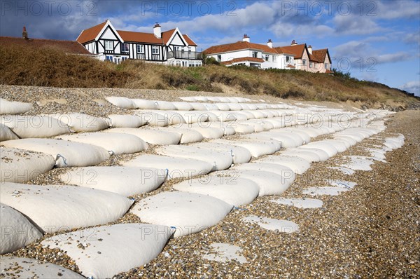 Coastal defences normally covered by shingle exposed by winter storms at Thorpeness, Suffolk,