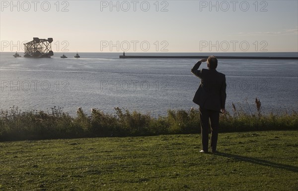 Large North Sea oil drilling platform leaving the River Tyne, Tynemouth, Northumberland, England,