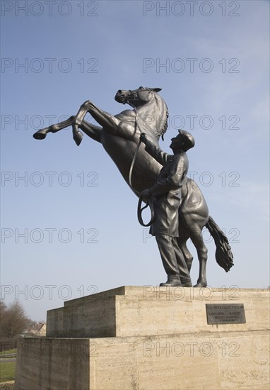 The Newmarket stallion sculpture by Marcia Astor and Allan Sly 2000 near the National Stud,
