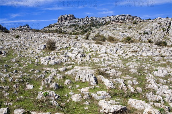 Dramatic limestone scenery of rocks shaped by erosion and weathering at El Torcal de Antequera