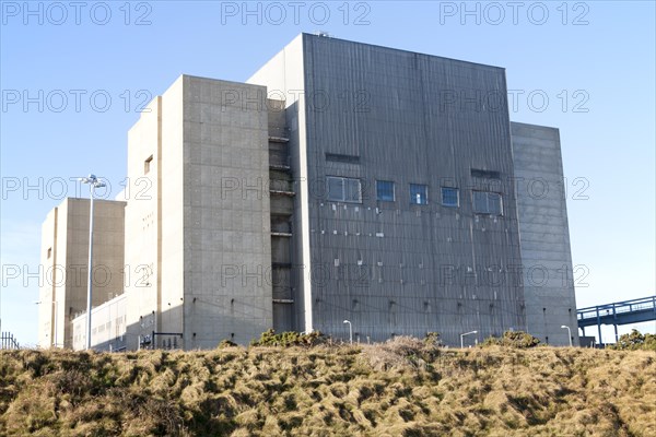 The decommissioned Magnox reactor block of Sizewell A nuclear power station, officially opened 7