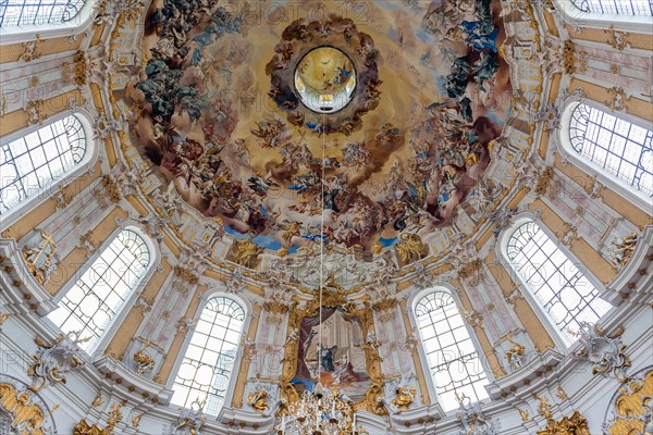 Baroque ceiling fresco with angels and golden ornaments in a magnificent church, Benedictine Abbey