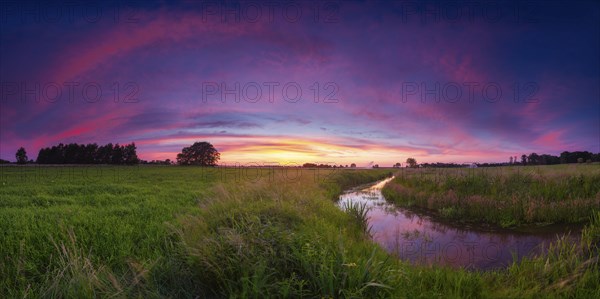 Landscape photo of a moat at sunset, panorama, wind, landscape format, evening light, landscape