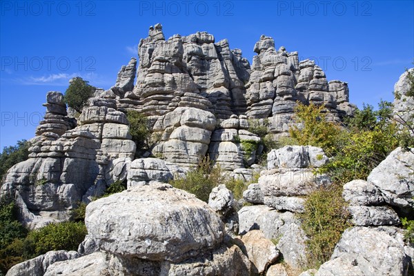 Dramatic limestone scenery of rocks shaped by erosion and weathering at El Torcal de Antequera