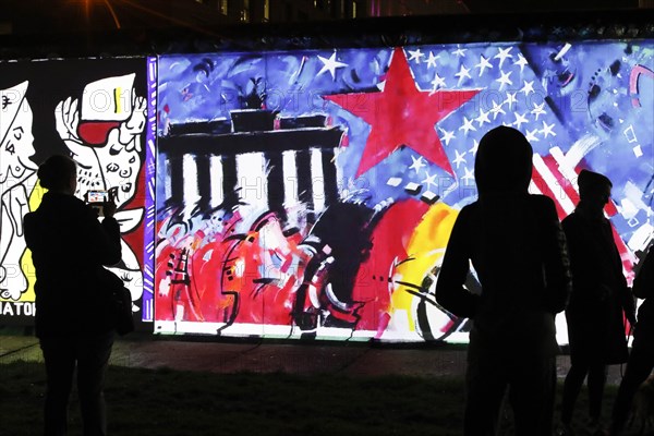 On the 30th anniversary of the fall of the Wall, 3D video projections of historical images and