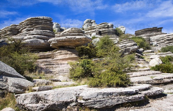 Dramatic limestone scenery of rocks shaped by erosion and weathering at El Torcal de Antequera