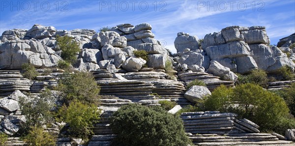Dramatic limestone scenery of rocks shaped by erosion and weathering at El Torcal de Antequera
