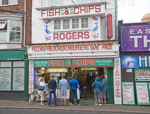 Rogers famous fish and chips shop with queue of people, Great Yarmouth, Norfolk, England, United