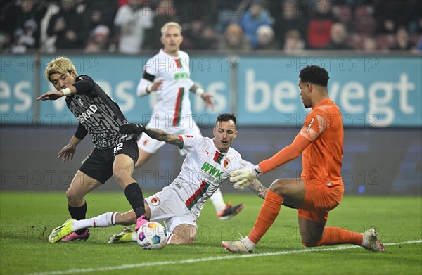 Penalty area scene, goal area scene duel, action Iago FC Augsburg FCA (22) against Ritsu Doan SC