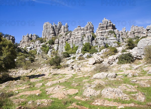 Dramatic limestone scenery of rocks shaped by erosion and weathering at El Torcal de Antequera