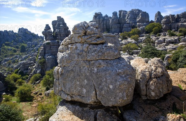 Dramatic limestone scenery of rocks shaped by erosion and weathering at El Torcal de Antequera