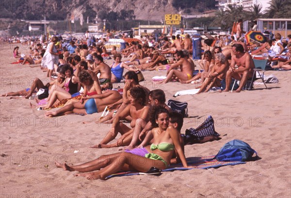 Crowded beach with sunbathers in Calella, Costa Brava, Barselona, Catalonia, Spain, Southern Europe