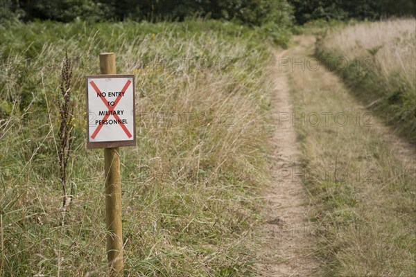 No entry sign for military personnel sign on country path, Sutton, Suffolk, England, United