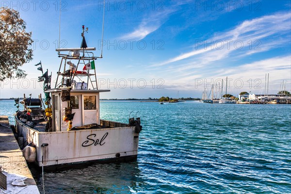 Fishing boat, island of the lagoon town of Grado, north coast of the Adriatic Sea, Friuli, Italy,