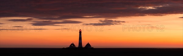 Lighthouse Westerheversand at sunset in summer, Westerhever, Wadden Sea National Park, North