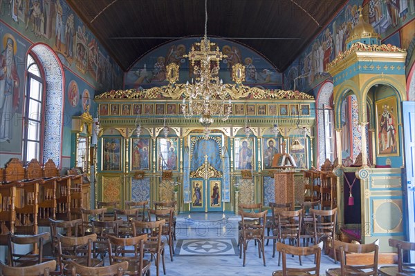 Interior of a church with iconostasis and wooden chairs, Monastery of St Nicholas, Monastery of