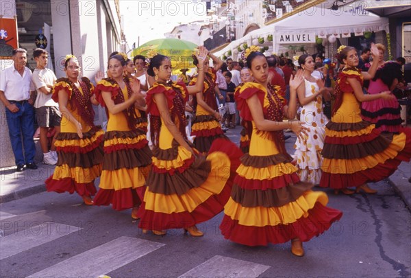 Girls from flamenco school perform at street party in Velez-Malaga, Andalusia, Spain, Southern