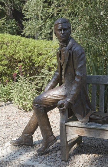 Charles Darwin as a young man sculpture 2002 by Anthony Smith, Christ's College, University of