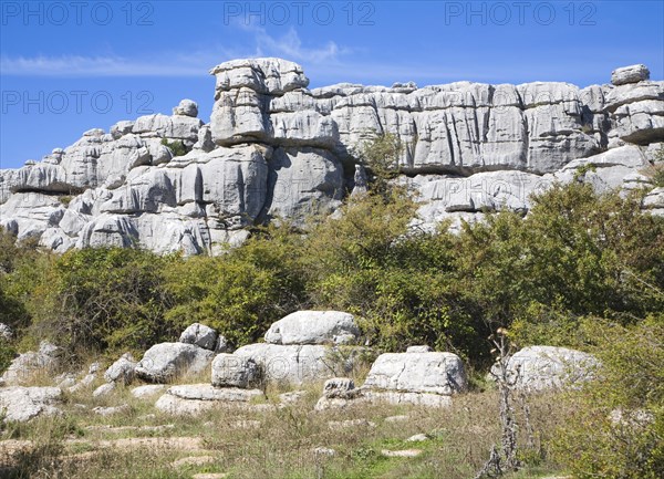 Dramatic limestone scenery of rocks shaped by erosion and weathering at El Torcal de Antequera