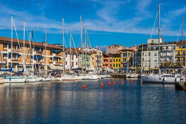 Sailing boats in the harbour, island of the lagoon town of Grado, north coast of the Adriatic Sea,