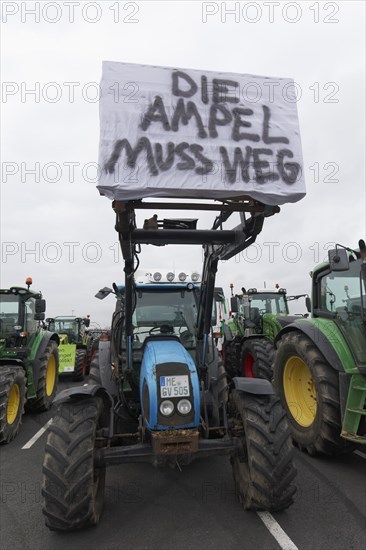 Tractor with sign, The traffic lights must go, Farmer protests, Demonstration against policies of