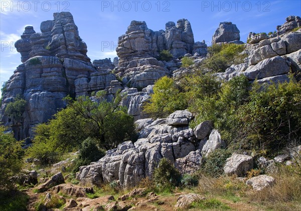 Dramatic limestone scenery of rocks shaped by erosion and weathering at El Torcal de Antequera