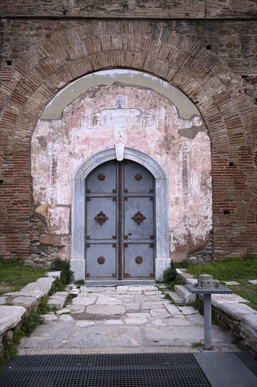 Exterior view of Rotonda, Rotunda of Galerius, Roman round temple, model in front of entrance door,