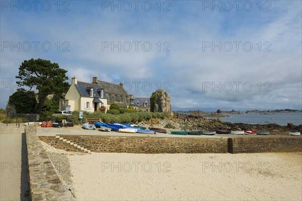 Houses and granite rocks on the beach, Plougrescant, Cote de Granit Rose, Cotes d'Armor, Brittany,