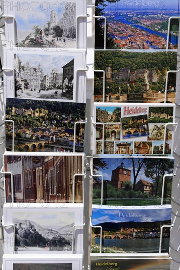 Postcard stand with various postcards of Heidelberg, Heidelberg, Baden-Wuerttemberg, Germany,
