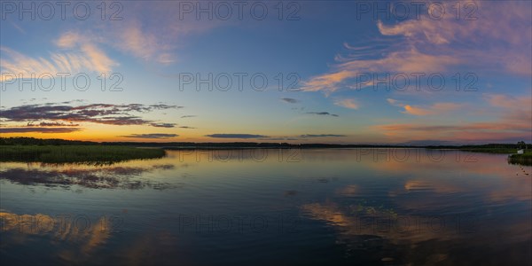 Landscape in the evening light, evening sun, evening sky, sunset, seascape, natural landscape,