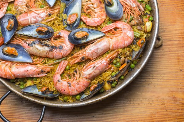 Seafood paella with prawns and shellfish, a feast for the senses, typical Spanish cuisine, Majorca,