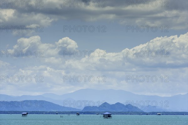 Island world near Surat Thani during ferry trip to Koh Samui, cloud, sky, blue sky, water, sea,