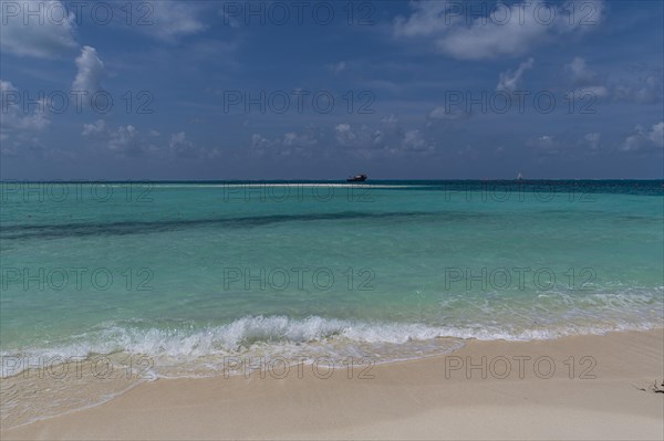 Turquoise waters on a white sand beach, Bangaram island, Lakshadweep archipelago, Union territory