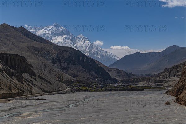 Huge riverbed before the Annapurna mountain range, Kingdom of Mustang, Nepal, Asia