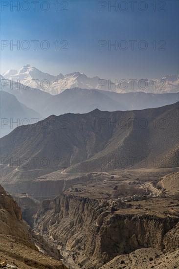 Desert mountain scenery with the Annapurna mountain range in the background, Kingdom of Mustang,