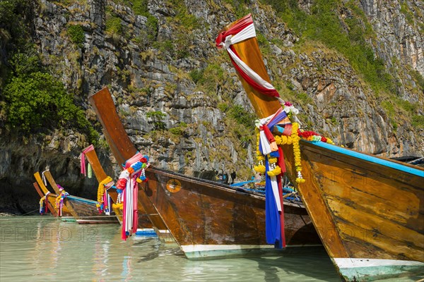 Longtail boat at Maya Bay, boat, wooden boat, ferry boat, ferry, passenger ferry, decorated, faith,