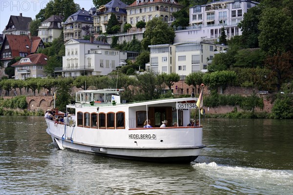 Close-up view of a boat on the water (Neckar), with passengers and a name plate, Heidelberg,