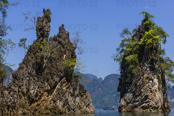 Limestone rocks in Cheow Lan Lake in Khao Sok National Park, nature, travel, holiday, lake,