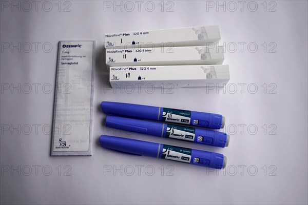 Ozempic injection pens and needle packs spread out, for diabetes 2 patients, Stuttgart,