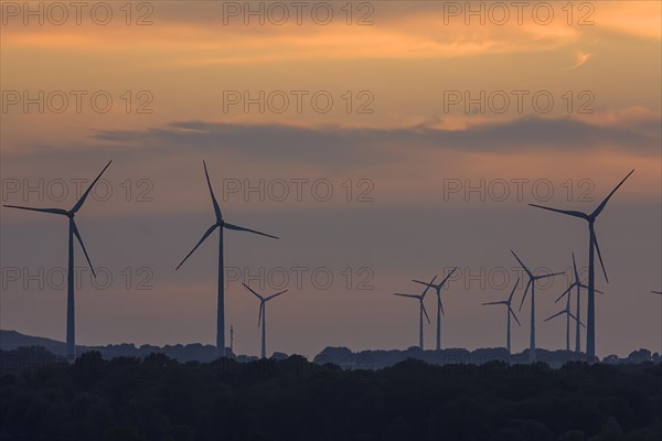Wind turbines in the sunset, Schoenberg, Mecklenburg-Vorpommern, Germany, Europe