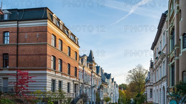 Old flats in a quiet street with autumn trees, Wilhelminian style, Briller Viertel, Elberfeld,