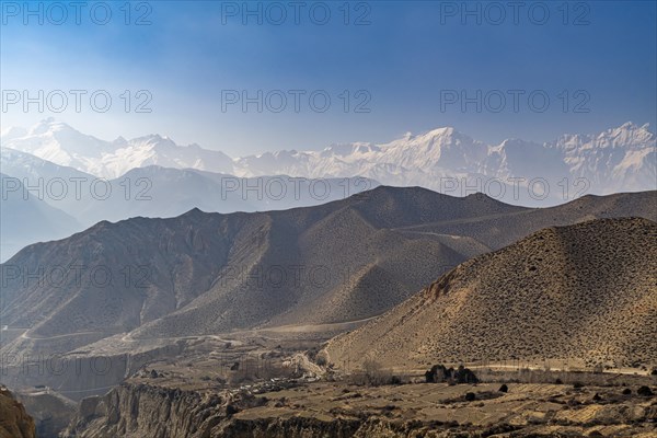 Desert mountain scenery with the Annapurna mountain range in the background, Kingdom of Mustang,