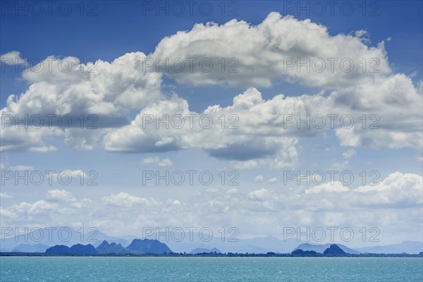 Island world near Surat Thani during ferry trip to Koh Samui, cloud, sky, blue sky, water, sea,